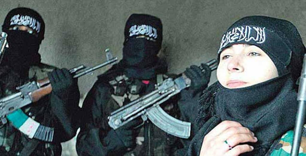 Two masked individuals holding rifles beside a woman in a hijab.