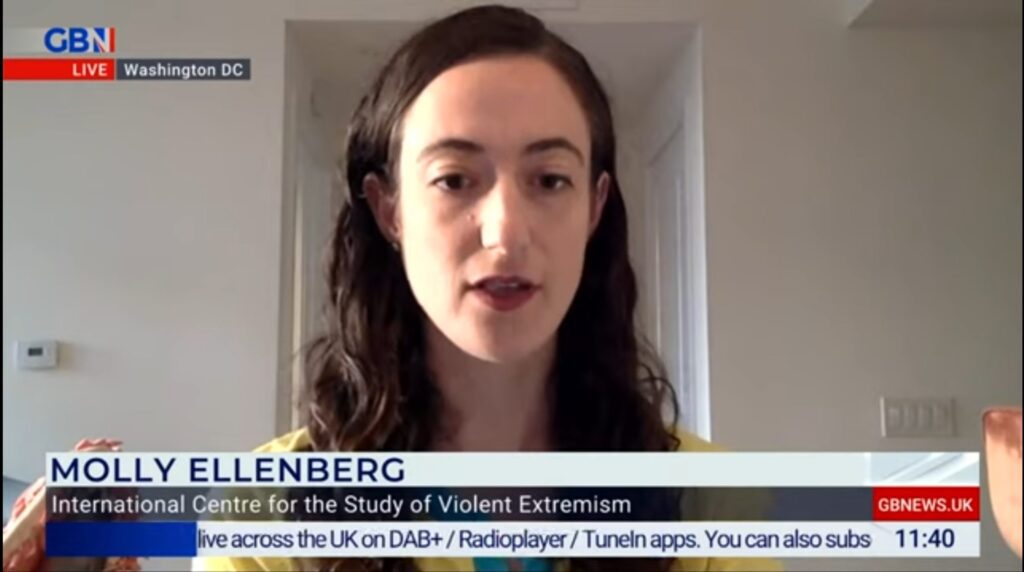 A woman speaks in a news interview about violent extremism.
