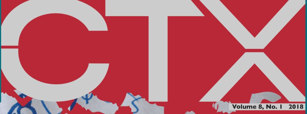 Part of a red and white logo with letters and a map segment.