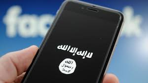 A smartphone screen displaying extremist group ISIS's flag.
