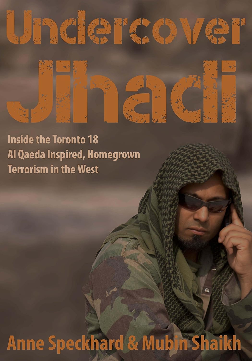 81lD9lPa7gL._SL1500_ Cover of a magazine titled 'Jihadi' featuring a man in military attire speaking on a phone.
