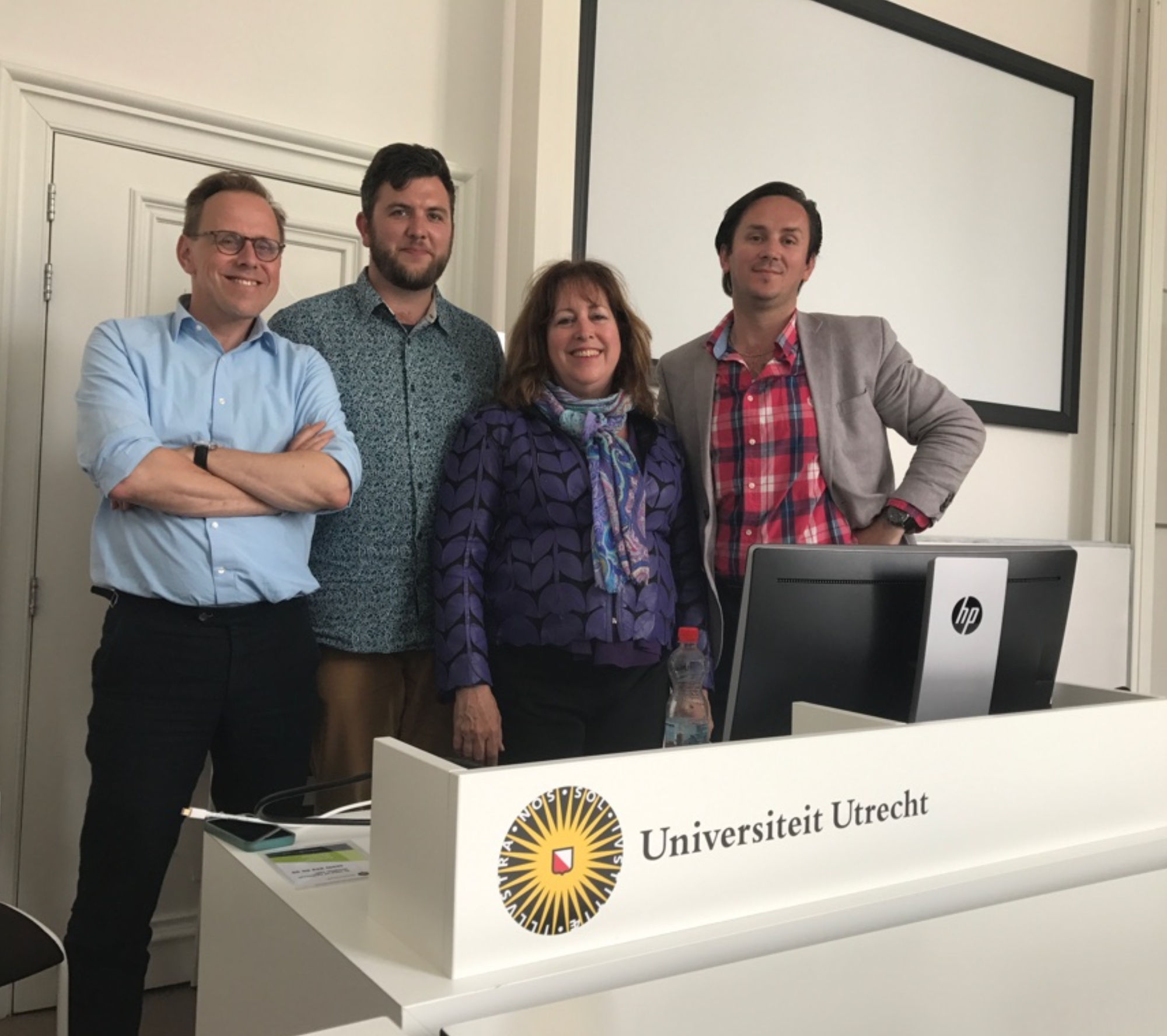 GettyImages-547523716 (1) Four people standing behind a podium at Universidad Eladio.