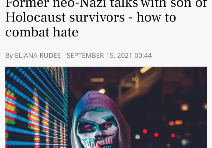A masked former neo-Nazi speaks about combating hate with Holocaust survivors' sons.